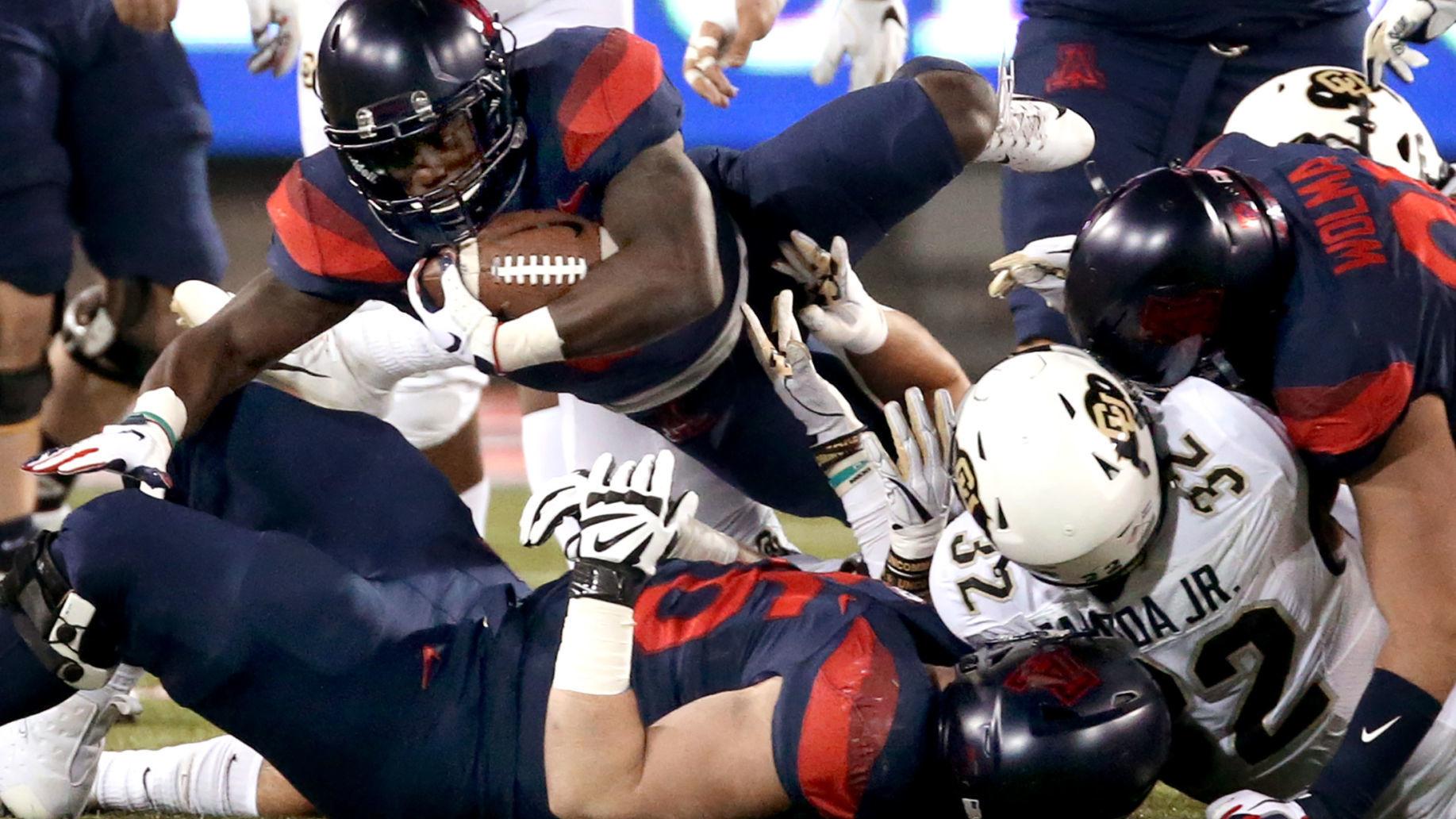 Khalil Tate, J.J. Taylor help Arizona edge Colorado 42-34